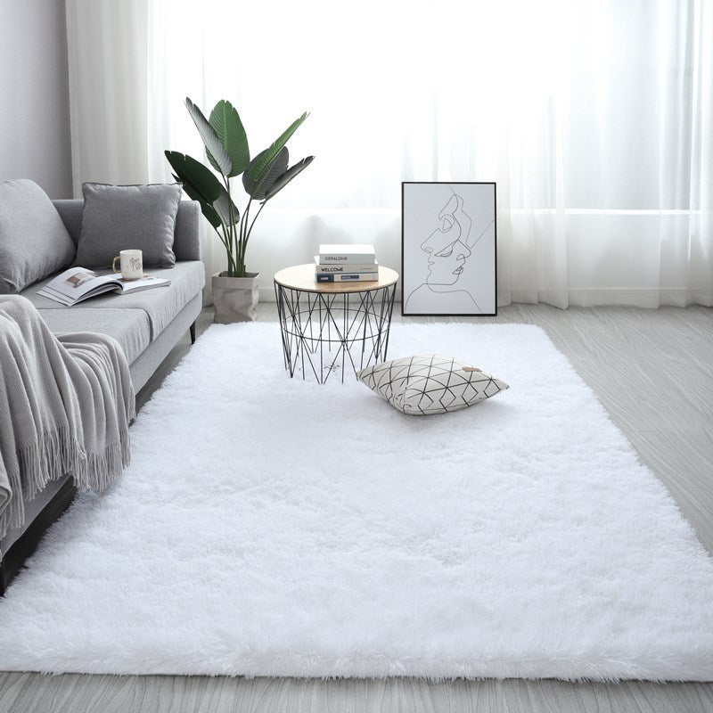 VibeCore Fluffy Area Rug in White, featuring a soft and plush texture that adds a cozy, luxurious feel to any room. This ultra-soft rug is perfect for creating a warm, inviting atmosphere while complementing various interior styles.