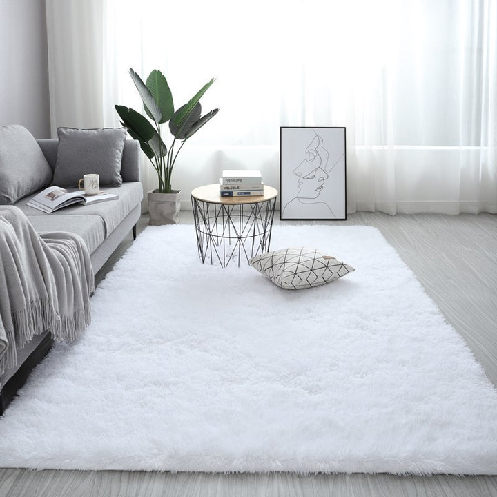VibeCore Fluffy Area Rug in White, featuring a soft and plush texture that adds a cozy, luxurious feel to any room. This ultra-soft rug is perfect for creating a warm, inviting atmosphere while complementing various interior styles.