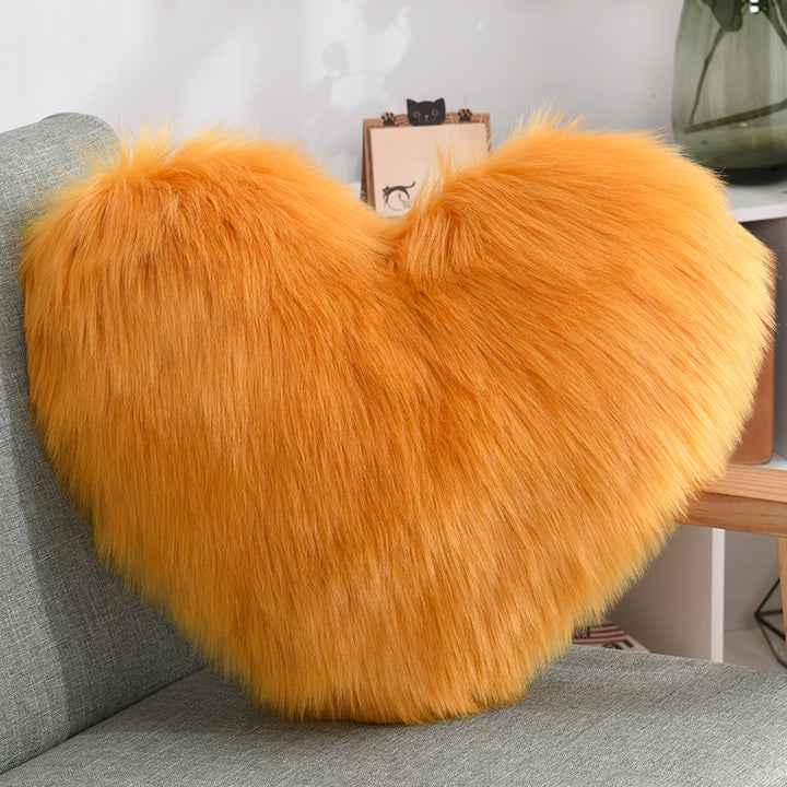 VibeCore Fluffy Heart Throw Pillow in orange - soft faux fur, heart-shaped design, perfect for adding a warm, playful touch to any room.