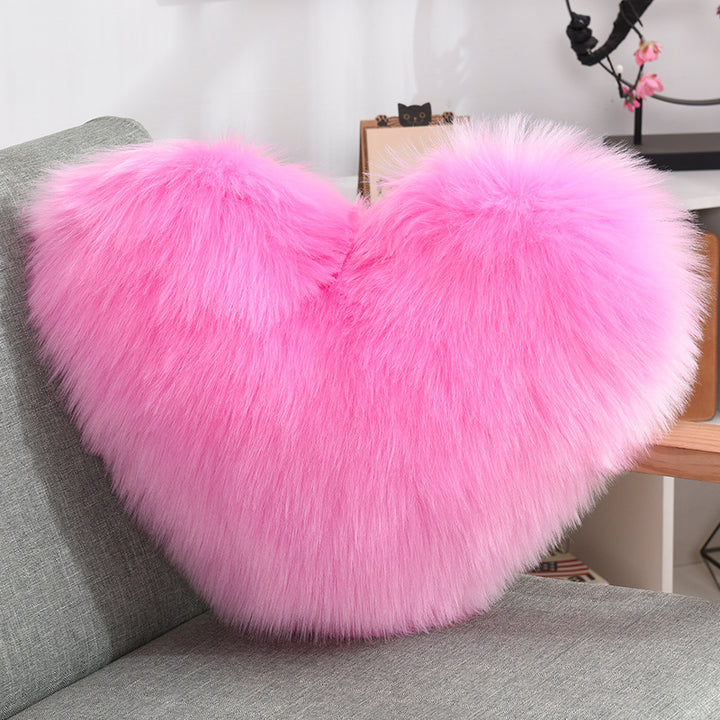 VibeCore Fluffy Heart Throw Pillow in pink - soft faux fur, heart-shaped design, perfect for adding cozy, romantic vibes to any space.
