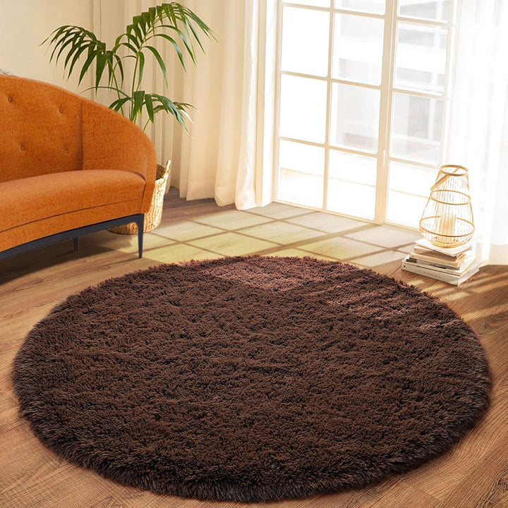 VibeCore Fluffy Round Area Rug in brown, soft plush texture with non-slip backing, perfect for bedroom, living room, or dorm. Cozy aesthetic, easy to clean, available in 8 colors.