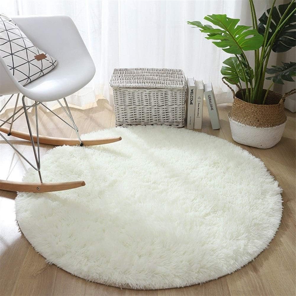 VibeCore Fluffy Round Area Rug in white, soft plush texture with non-slip backing, perfect for bedroom, living room, or dorm. Cozy aesthetic, easy to clean, available in 8 colors.