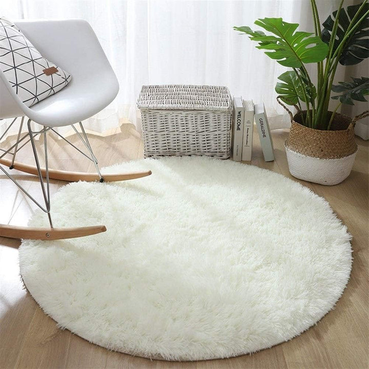 VibeCore Fluffy Round Area Rug in white, soft plush texture with non-slip backing, perfect for bedroom, living room, or dorm. Cozy aesthetic, easy to clean, available in 8 colors.