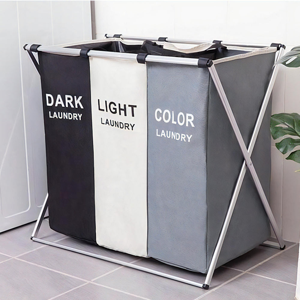 VibeCore Foldable Laundry Basket Organizer in three colors, placed in a laundry room for efficient laundry sorting, featuring a large-capacity, waterproof design with reinforced handles.