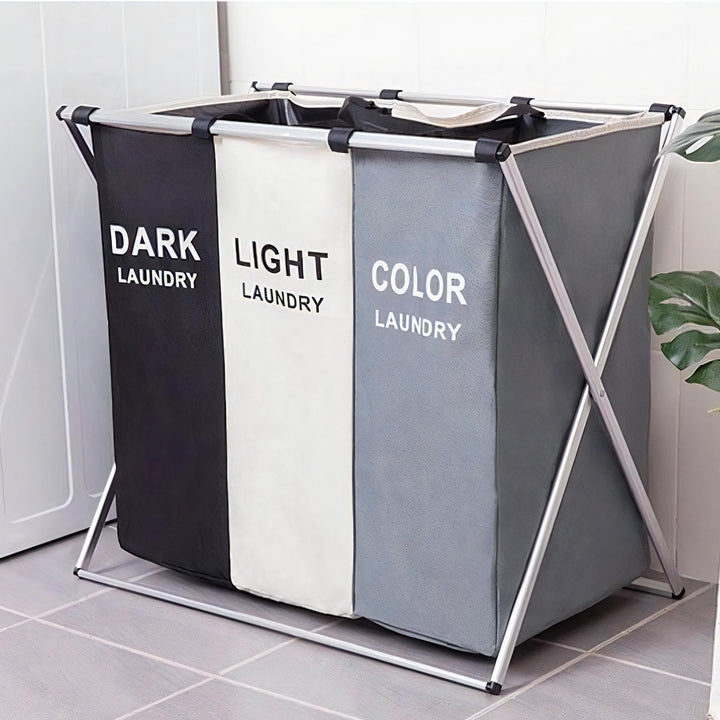 VibeCore Foldable Laundry Basket Organizer in three colors, placed in a laundry room for efficient laundry sorting, featuring a large-capacity, waterproof design with reinforced handles.