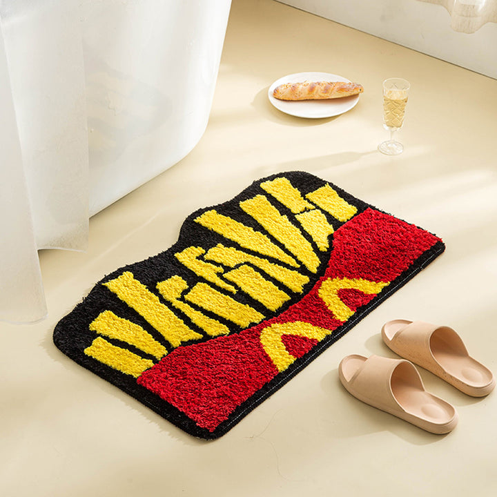 Aerial side view of the VibeCore Fries Accent Rug, showcasing its playful fries design, soft plush texture, vibrant colors, and non-slip backing. This cute rug adds a fun, nostalgic touch to any room, perfect for bedrooms, dorms, or living rooms. Ideal as a cute rug for bedroom or dorm room decor, it brings a modern, aesthetic vibe to contemporary spaces. Its unique design works as a cool small rug for tight areas, making it a great accent piece for adding personality and comfort to any space.