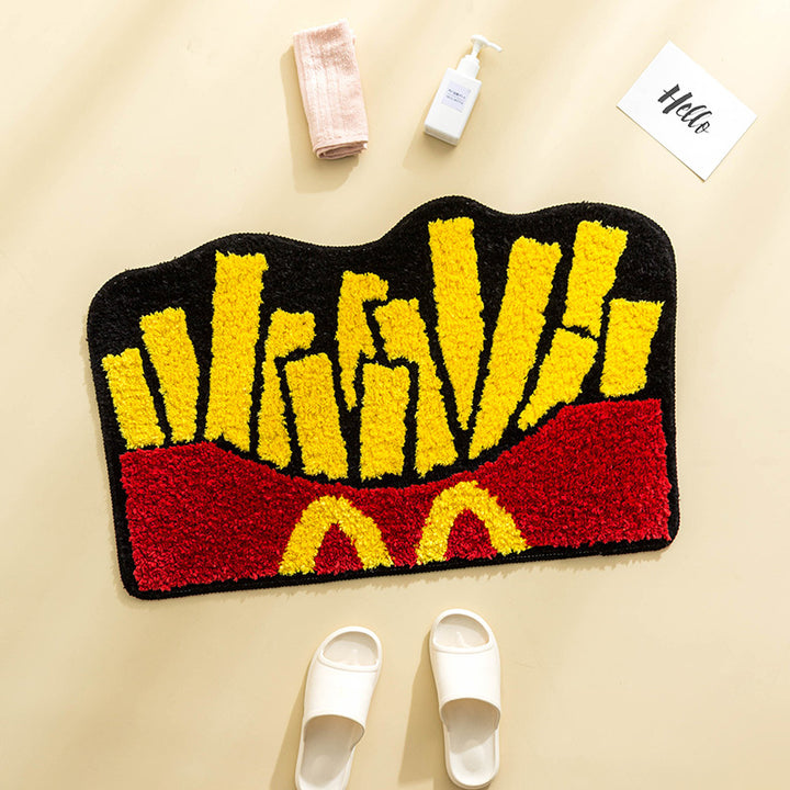 VibeCore Fries Accent Rug with shoes in front to demonstrate size, showcasing its playful fries design, vibrant colors, and plush texture. This cute rug adds a fun, nostalgic touch to bedrooms, dorms, or living rooms. Its non-slip backing ensures safety, while its modern aesthetic fits perfectly in contemporary spaces. Ideal as a cute rug for bedroom or dorm decor, this rug brings comfort, personality, and style, making it a unique and cozy addition to any room.