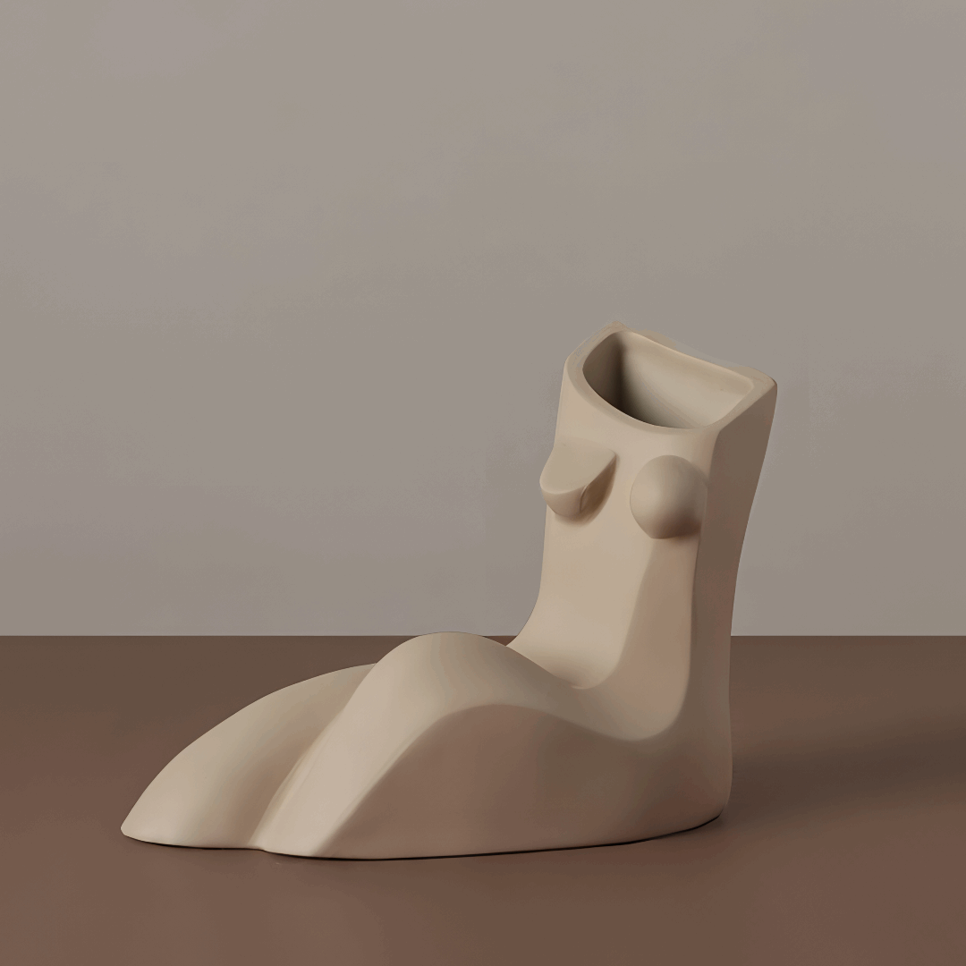 VibeCore Geometric Female Body Vase Beige, featuring a minimalist sculpted female figure with smooth curves and geometric lines, crafted from high-quality ceramic for a chic, modern look.