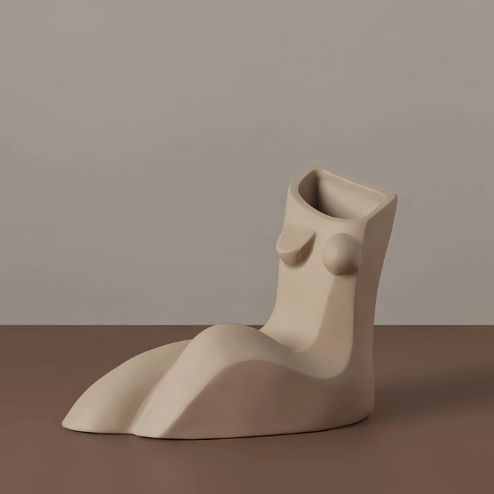 VibeCore Geometric Female Body Vase Beige, featuring a minimalist sculpted female figure with smooth curves and geometric lines, crafted from high-quality ceramic for a chic, modern look.