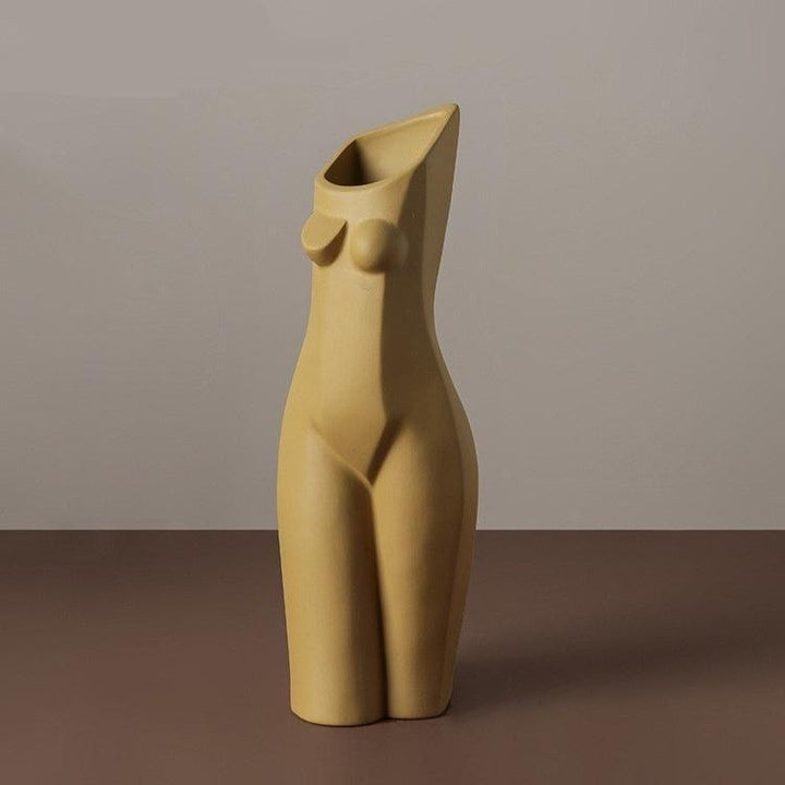 VibeCore Geometric Female Body Vase Khaki, featuring an artistic design that combines geometric lines and organic curves, crafted from high-quality ceramic for a sophisticated, modern aesthetic.
