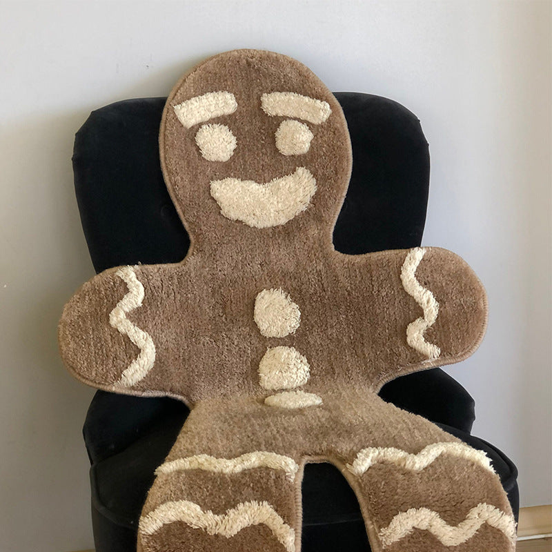 VibeCore Gingerbread Man Accent Rug on Sofa Chair, featuring the adorable gingerbread man design in a cozy setting, adding warmth and charm to the room with its soft, fluffy texture.