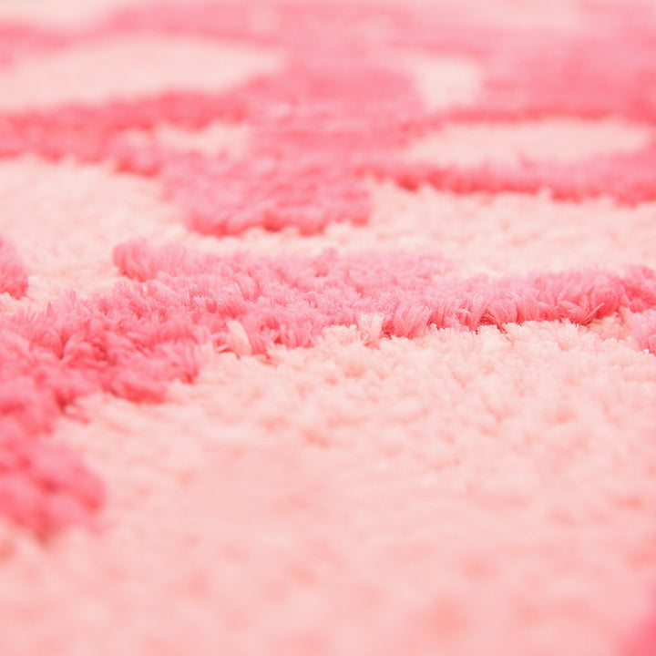 Close-up view of the VibeCore Girls Don’t Cry Accent Rug, showcasing the soft, plush texture and bold pink design with the empowering message, ideal for adding personality and comfort to any room.