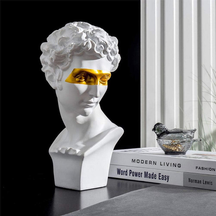 VibeCore Gold-Eye David Sculpture in white on desk, crafted from durable resin, combining classic European style with a modern gold-eye twist, perfect for adding sophistication to your space.