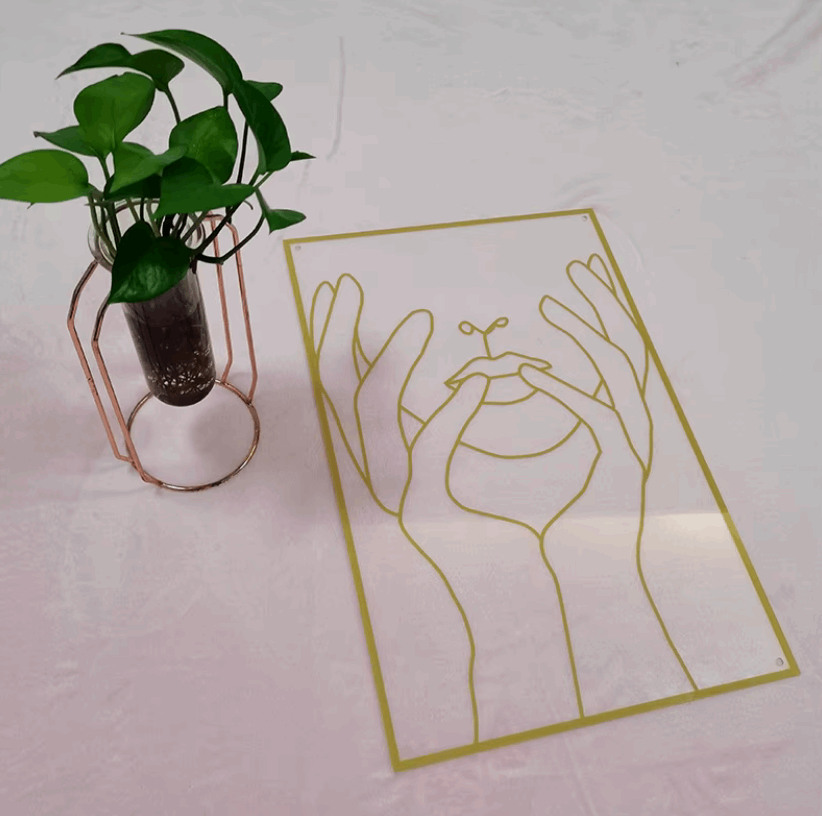 Gold female line art wall decor laid flat – metallic gold acrylic silhouette wall art for modern bedroom, dorm room, or office – VibeCore minimalist aesthetic decor