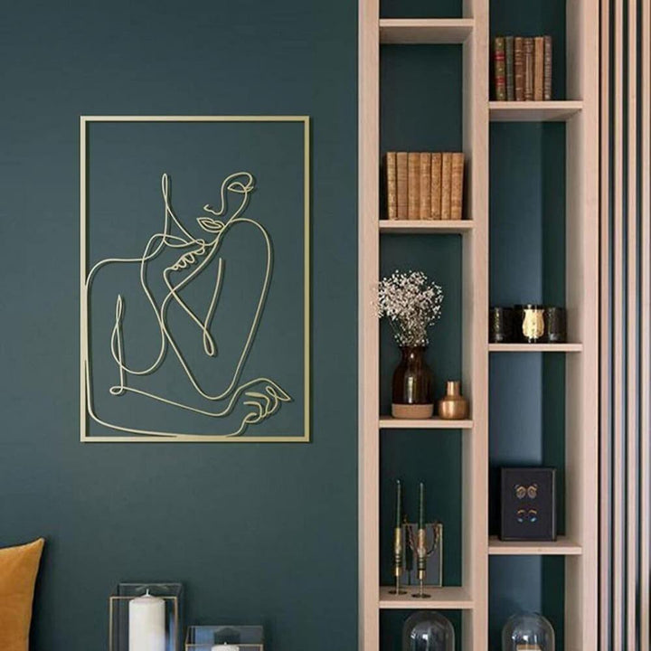 Gold female line art wall decor on wall – metallic gold acrylic silhouette wall art for modern bedroom, dorm room, or office – VibeCore minimalist aesthetic decor