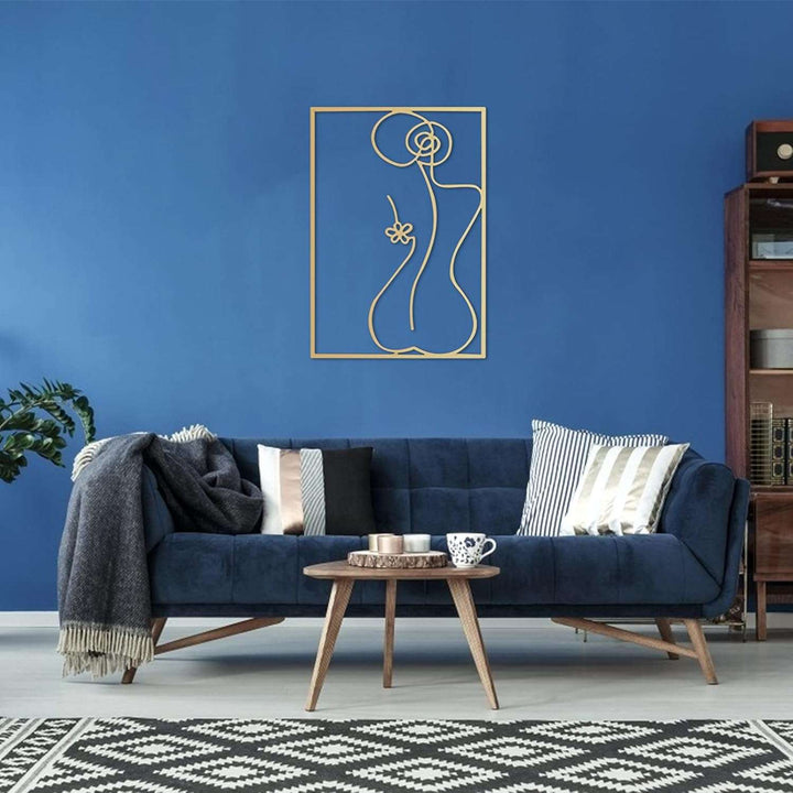 Gold female line art wall decor on living room wall – metallic gold acrylic silhouette of woman's back for modern living room, bedroom, or office – VibeCore minimalist aesthetic decor