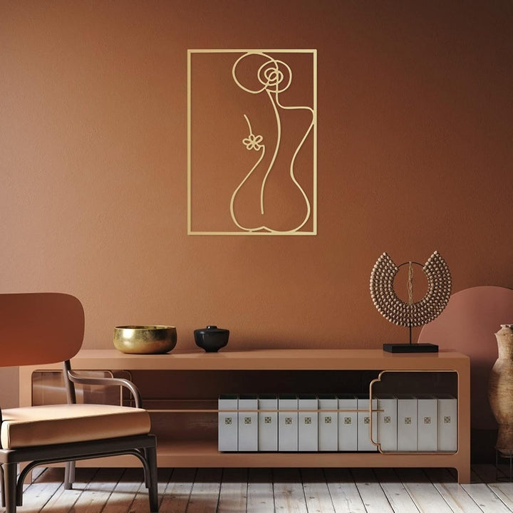 Gold female line art wall decor on wall – metallic gold acrylic silhouette of woman's back for modern bedroom, dorm room, or office – VibeCore minimalist aesthetic decor