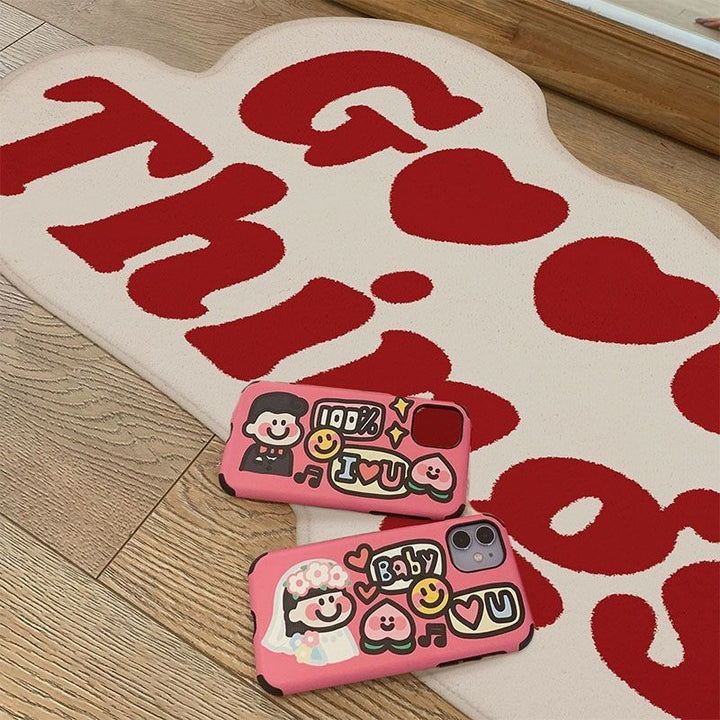 Aesthetic red "Good Things Accent Rug" displayed on the floor, featuring a motivational Y2K message. The soft, plush texture and non-slip backing provide comfort and stability, making it a perfect addition to any room, adding warmth and positivity to your space.