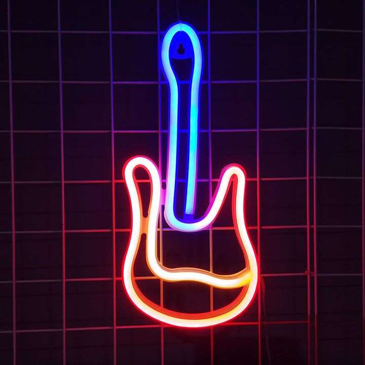 VibeCore Guitar Neon Light glowing on a wall, creating a vibrant and rock-inspired ambiance in the room.