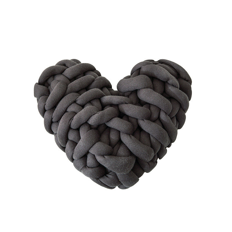 VibeCore Heart-Shaped Knot Throw Pillow in black, featuring a heart-shaped, woven knot design made from soft polyester fiber. A cozy and stylish accent that adds a touch of charm and warmth to any space, perfect for creating a cozy, loving vibe.