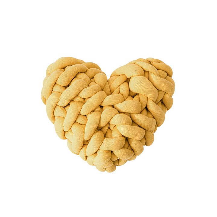 VibeCore Heart-Shaped Knot Throw Pillow in yellow, featuring a heart-shaped, woven knot design made from soft polyester fiber. A cozy and stylish accent that adds a touch of charm and warmth to any space, perfect for creating a cozy, loving vibe.