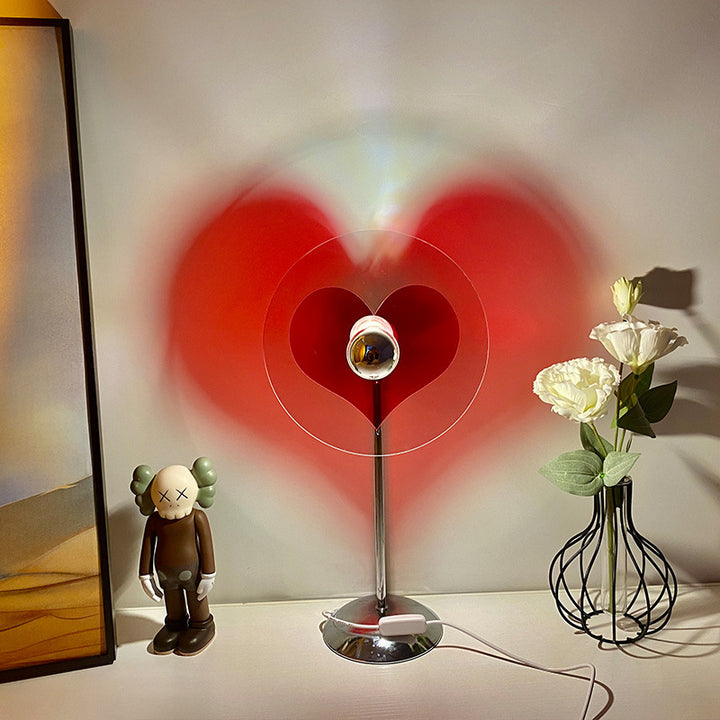 VibeCore Heart Mood Lamp on desk, casting a cozy heart-shaped shadow with soft, diffused lighting, adding a romantic and stylish vibe to the space.