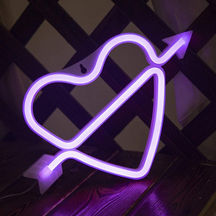 VibeCore Heart and Arrow Neon Light Purple Against Wall