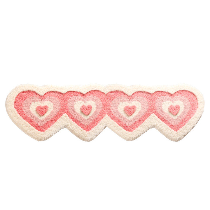 Aesthetic "Hearts Multiply Accent Rug" in large size, featuring a playful pattern of multiplying hearts. This cute pink rug adds a sweet, cozy vibe to any space, with a soft, plush texture and non-slip backing for comfort and stability. Perfect for living rooms, bedrooms, or dorms.