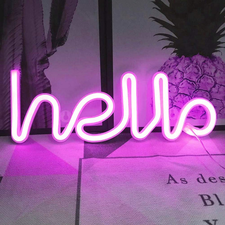 VibeCore Hello Cursive Neon Light Pink Against Wall