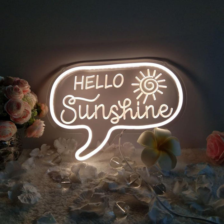 VibeCore Hello Sunshine Neon Light on Table With Flower Petals Around It