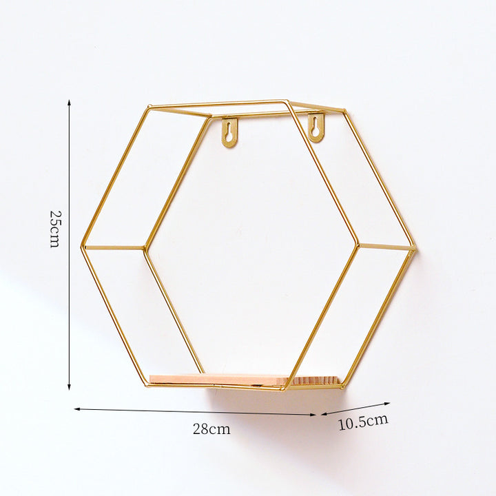 VibeCore Hexagonal Floating Wall Shelf in gold, large size, mounted on a wall with decorative items like candles, plants, and frames.