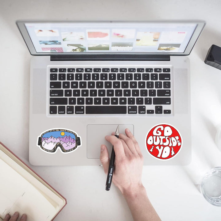 VibeCore Hiking and Mountains Stickers on a laptop showcasing mountain landscapes, adventure quotes, and outdoor exploration designs for nature lovers and adventurers.