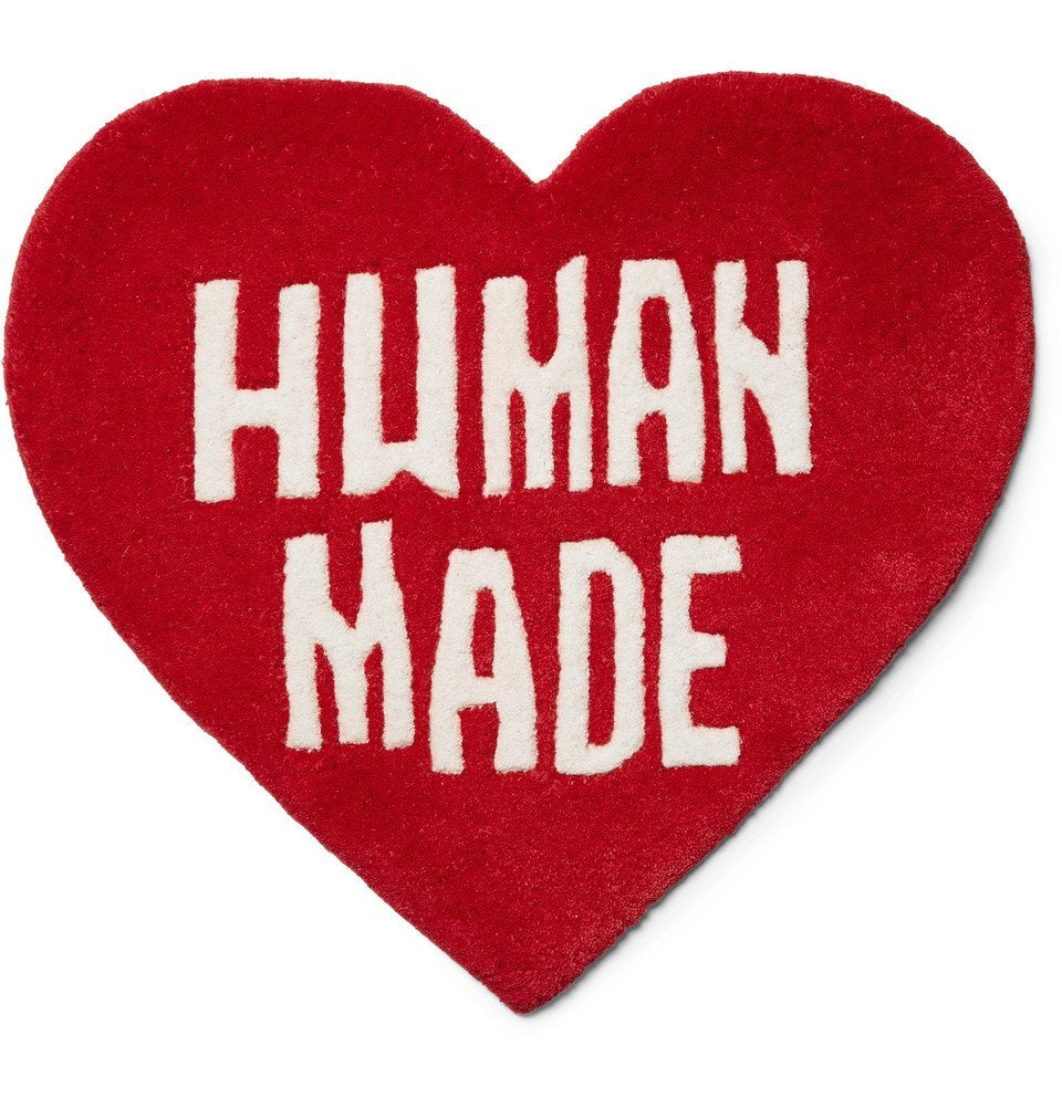 VibeCore Human Made Accent Rug in red, featuring a bold heart design. This stylish rug showcases a plush texture and modern aesthetic, perfect for adding a vibrant touch to any room while offering comfort and safety with its non-slip backing.