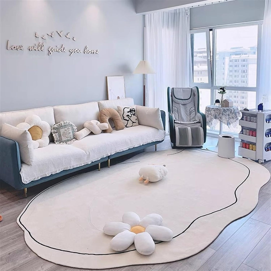 VibeCore Ivory Abstract Oval Area Rug in living room, showcasing the rug's smooth oval shape and neutral tones, adding sophistication and cozy charm to the space.