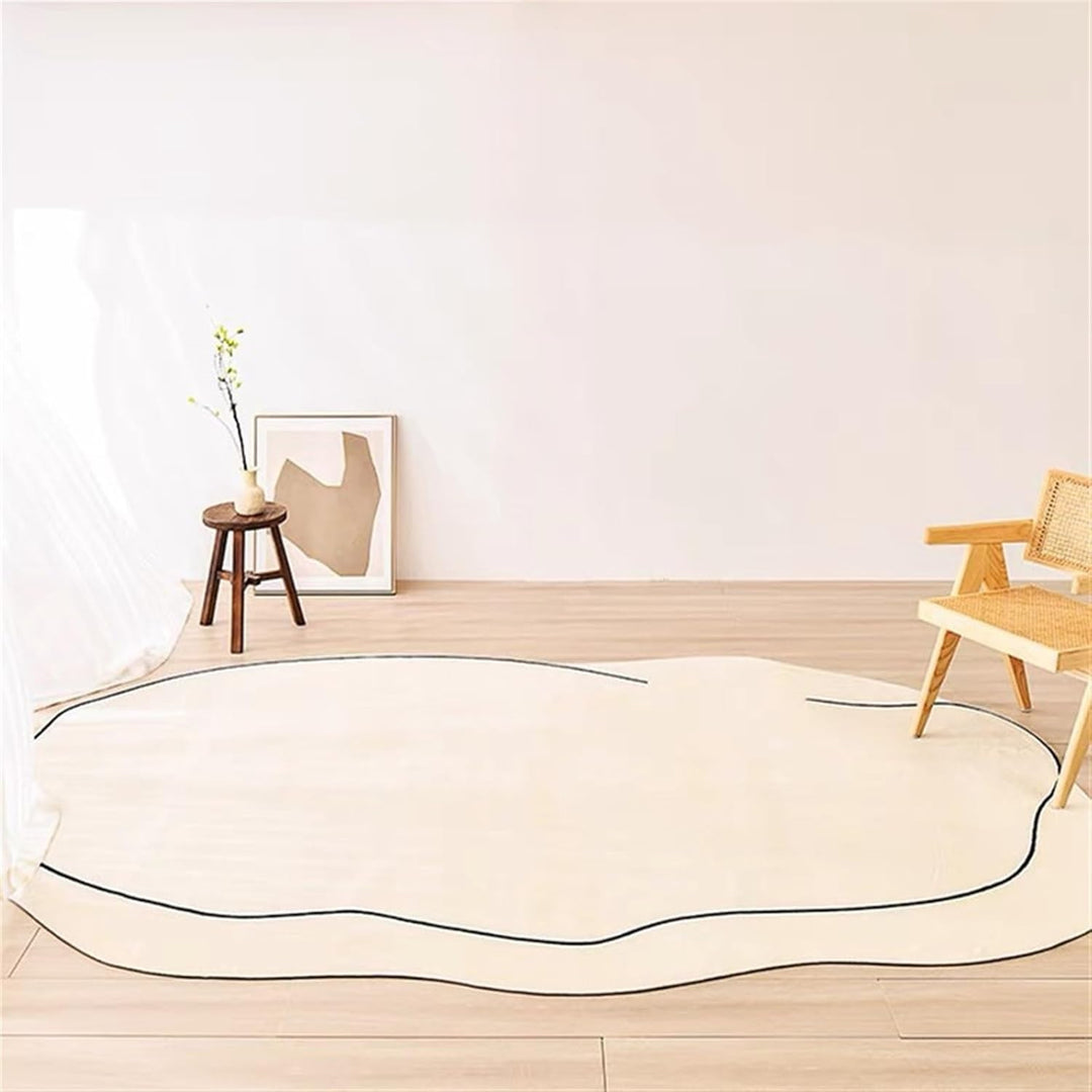 VibeCore Ivory Abstract Oval Area Rug on floor, showcasing its smooth oval shape and neutral tone that enhances the elegance and comfort of any space.