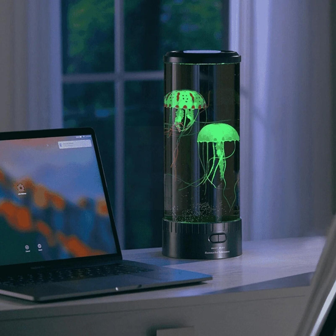 VibeCore Jellyfish Lava Lamp in Green, showcasing two realistic jellyfish floating in a serene, color-changing glow. The calming LED lights create a tranquil ambiance, ideal for unwinding or focusing. USB or battery-powered, this lamp also includes a remote control for easy color and setting adjustments.
