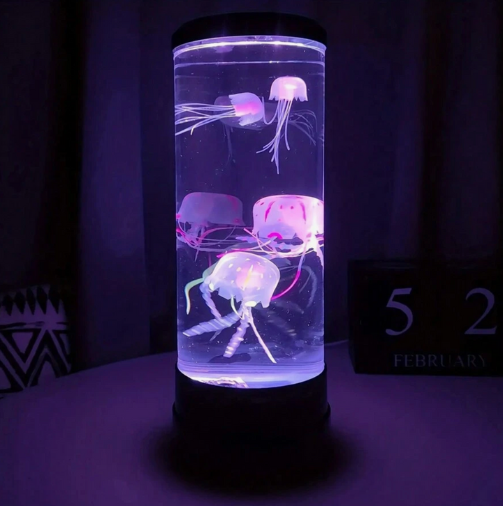 VibeCore Jellyfish Lava Lamp in Purple, featuring two lifelike jellyfish floating and creating a peaceful, calming glow. The color-changing LED lights offer a tranquil atmosphere, perfect for relaxing or studying. This USB or battery-powered lamp comes with a remote control for easy customization.