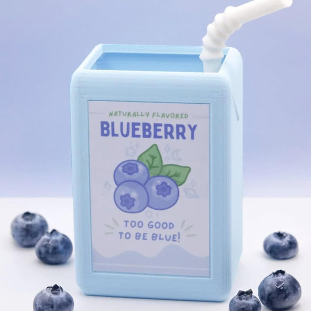 Add a burst of fun and color to your decor with the VibeCore Juice Box Planter in Blueberry! Inspired by the playful look of a blueberry juice box, this resin planter is perfect for bringing a sweet, vibrant touch to any space. Ideal for small plants or succulents, it’s a quirky, eye-catching piece for your desk, windowsill, or shelf. With its refreshing blueberry hue, this planter adds a pop of color and personality, making it a must-have for anyone seeking unique, eclectic room decor.
