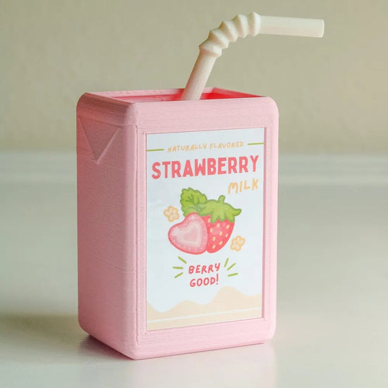 Add a sweet touch to your space with the VibeCore Juice Box Planter in Strawberry Milk! This adorable resin planter, inspired by your favorite fruity milk drink, offers a playful and nostalgic vibe to any room. Perfect for small plants or succulents, it’s a unique decor piece for your desk, windowsill, or shelf. With its soft pink strawberry milk design, this planter adds a fun, eclectic twist to your space, making it a must-have for anyone seeking a quirky, vibrant addition to their decor.