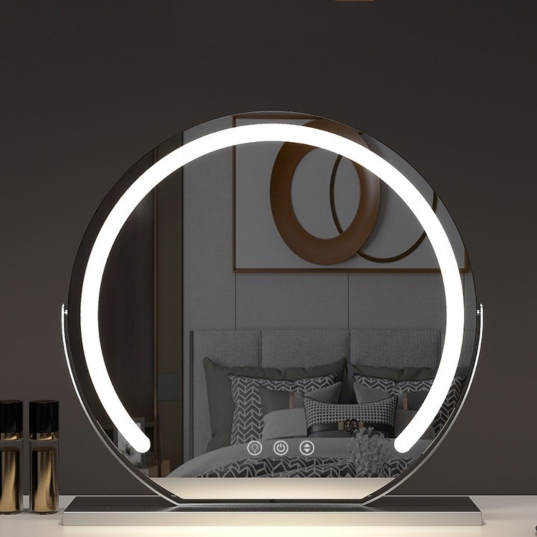 VibeCore LED Light-Up Vanity Mirror featuring a sleek metal frame, with built-in LED light strip and a 360° rotating design, offering adjustable brightness and lighting options.