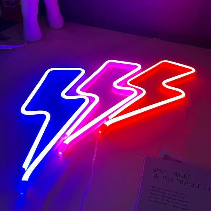 Aesthetic VibeCore Lightning Neon Light in blue, pink, and red on a table, USB or battery-powered LED sign for trendy bedroom, dorm, or gaming room decor.