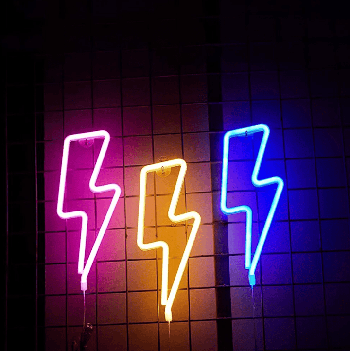 Aesthetic VibeCore Lightning Neon Light in blue, pink, and warm white on the wall, USB or battery-powered LED sign for trendy bedroom, dorm, or gaming room decor.