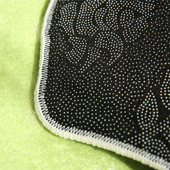 Close-up of the VibeCore Lil Blob Guy Accent Rug backing, featuring a non-slip surface that ensures the rug stays securely in place, even in high-traffic areas. The durable backing adds safety and stability to the soft, plush design.