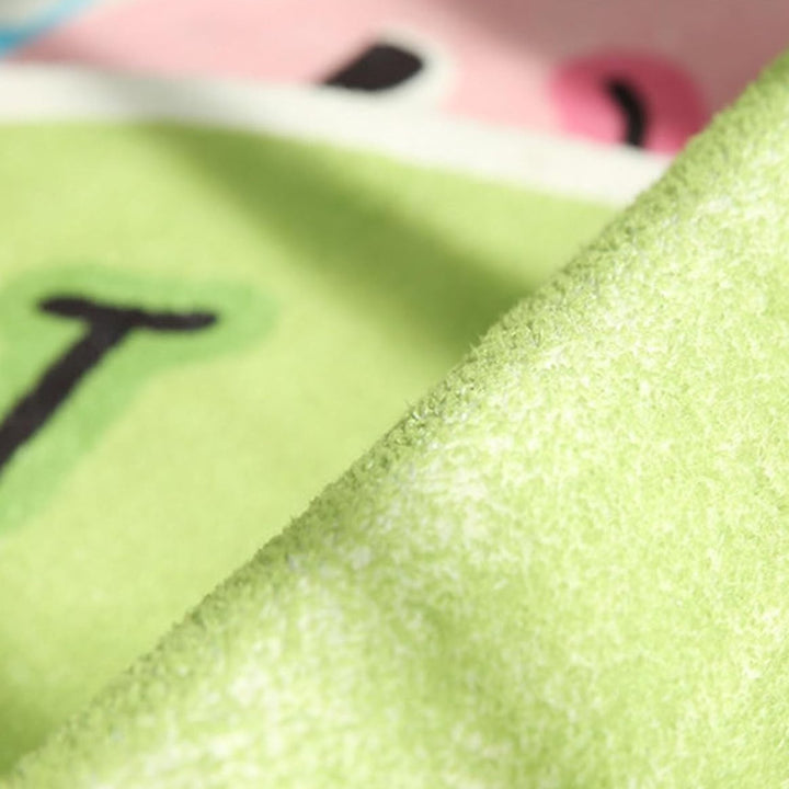 Close-up of the VibeCore Lil Blob Guy Accent Rug material, showcasing the soft and plush texture. The rug features a smooth, high-quality fabric with a non-slip backing, ideal for adding comfort and style to any space.