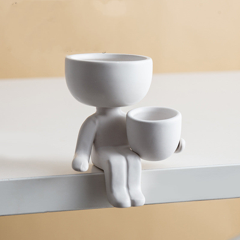 VibeCore Lil Buddy Planter in white, quirky humanoid design, Nordic-inspired style, crafted from premium clay, perfect for adding personality to your plants and decor.