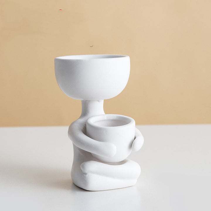 VibeCore Lil Buddy Planter in white, quirky humanoid design, Nordic-inspired style, crafted from premium clay, ideal for showcasing your plants with a playful touch to your decor.