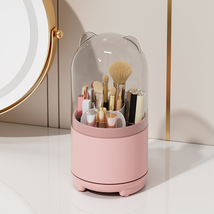 VibeCore Little Ears Rotating Makeup Brush Holder in pink with a playful design, rotating base, and dust-free cover for organized beauty tools.