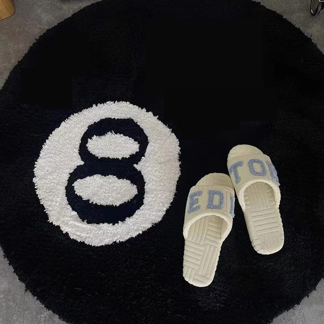 Another close up shot of the VibeCore Lucky 8 Accent Rug to demonstrate its size and texture. A cool black and white, billiard ball inspired rug that easily enhances your bedroom or dorm aesthetic.