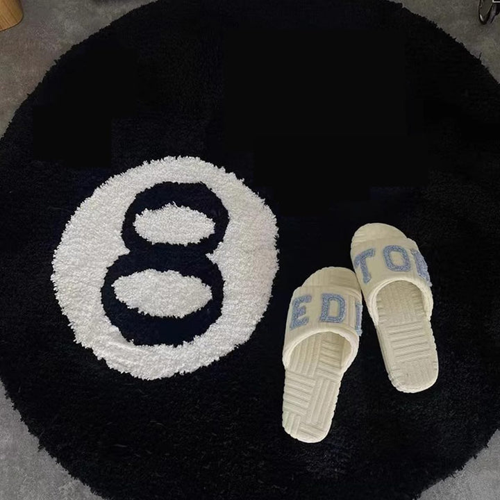 Another close up shot of the VibeCore Lucky 8 Accent Rug to demonstrate its size and texture. A cool black and white, billiard ball inspired rug that easily enhances your bedroom or dorm aesthetic.