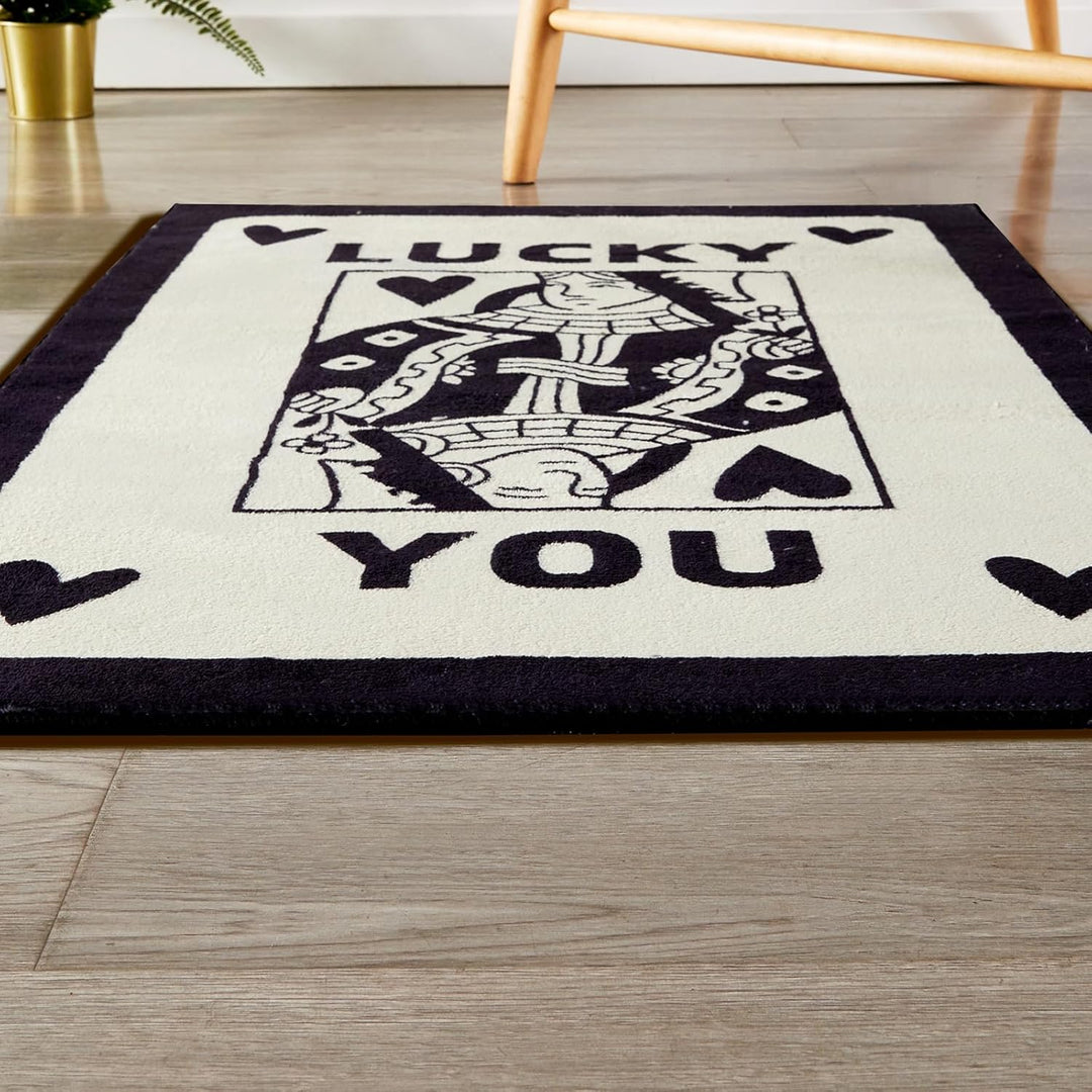 Aesthetic black and white "Lucky You" accent rug with a playful card design, shown in a front view close-up. This soft, fluffy rug highlights its plush texture and bold details, featuring a non-slip bottom for safety and easy maintenance. Perfect for dorms, bedrooms, and cozy spaces.